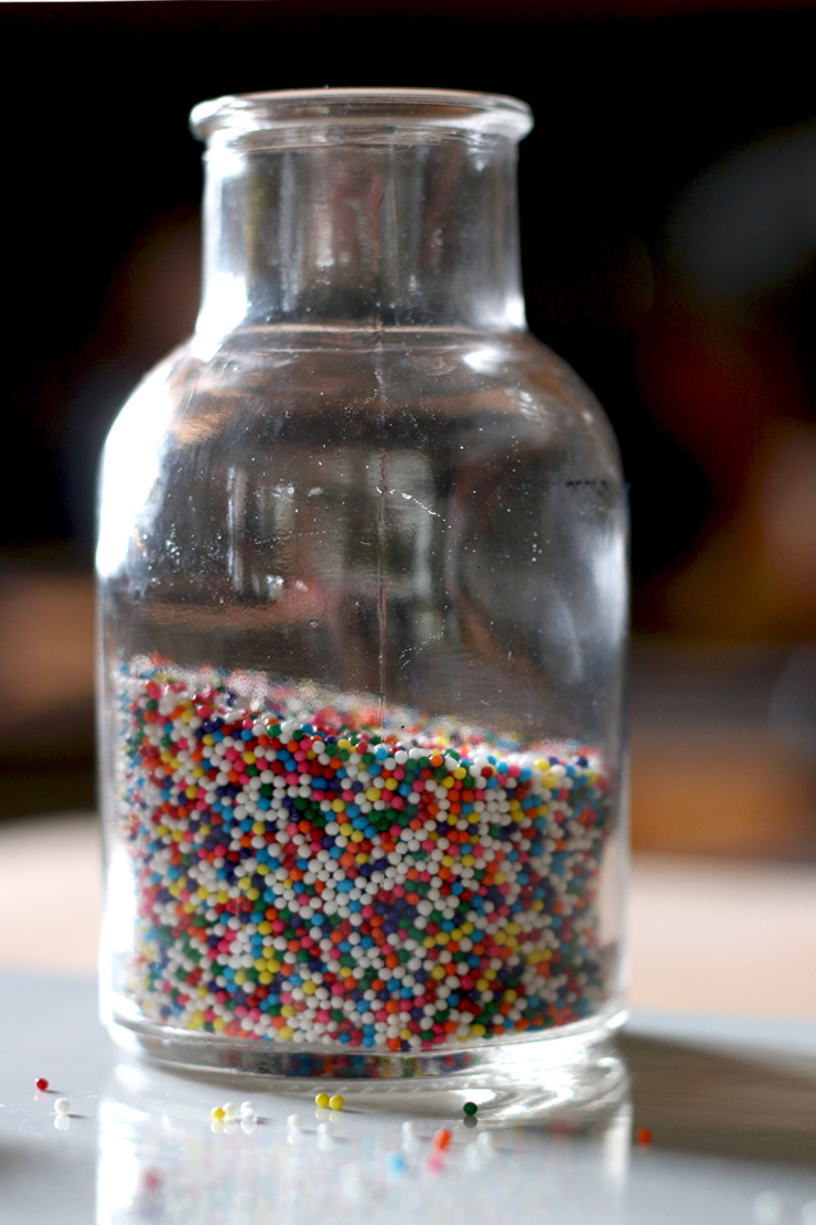 a small jar of multicolored Animal Cookie Sprinkles
