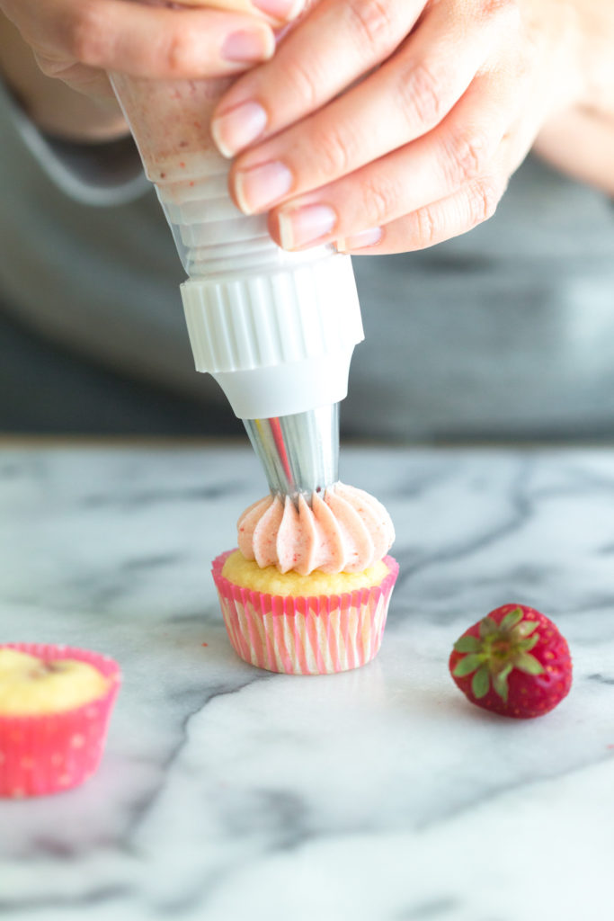 Mini Strawberry Lemon Cupcakes - piping frosting