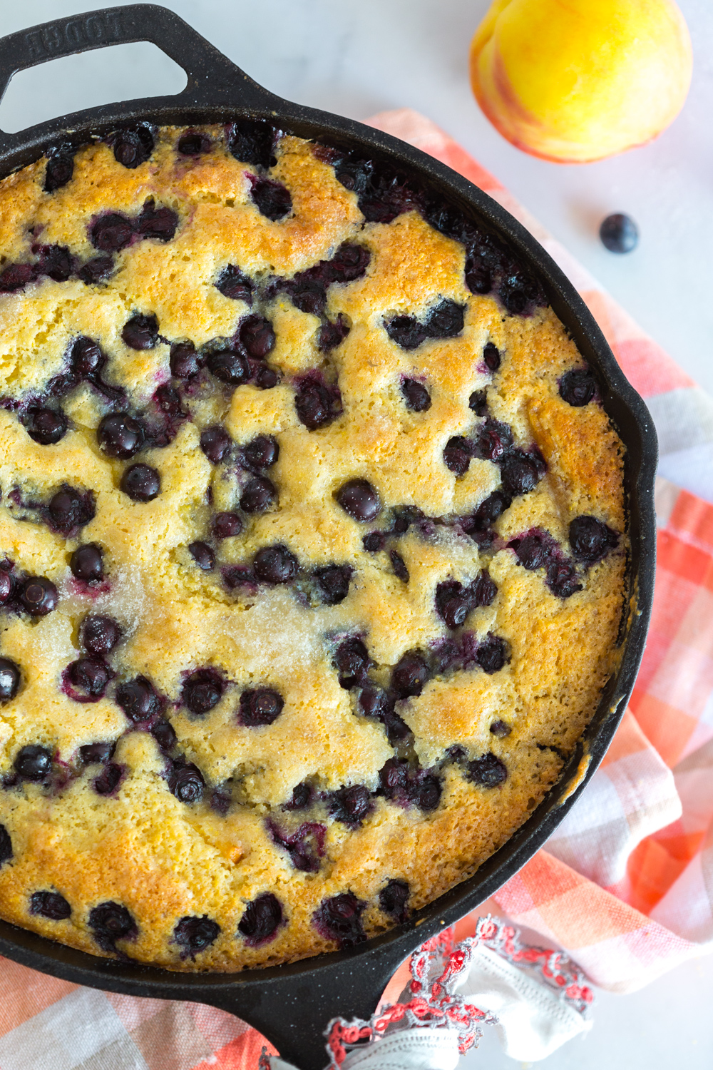 Blueberry Peach Cornmeal Skillet Cake cooling
