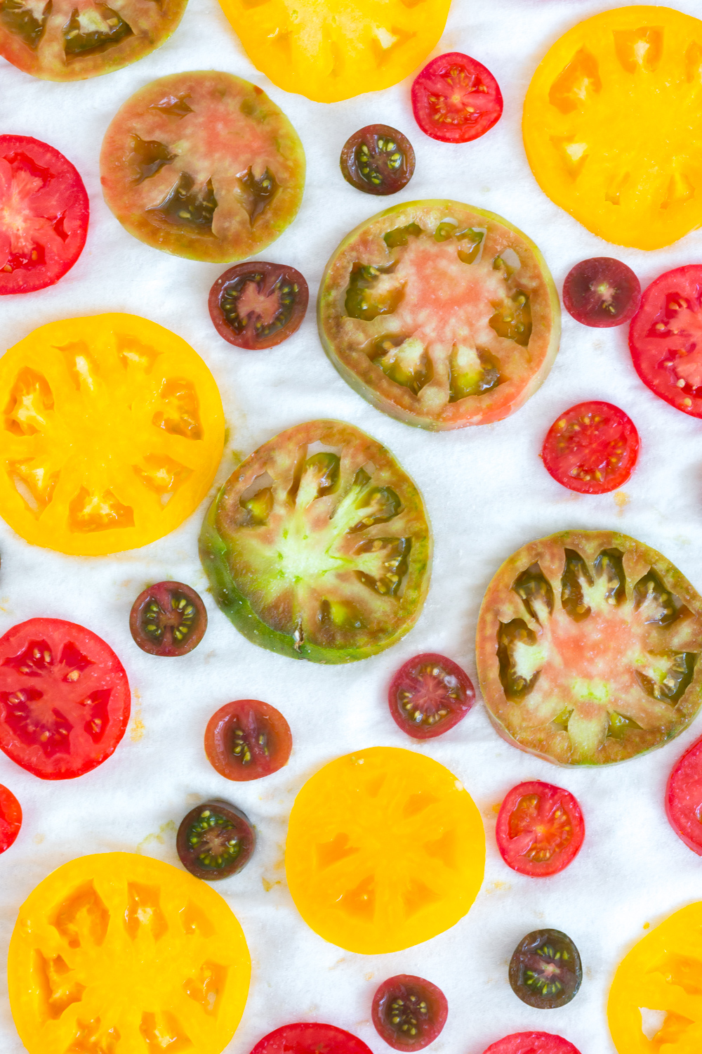 Sliced tomatoes for Heirloom Tomato and Pimento Cheese Tart with Cornmeal Crust