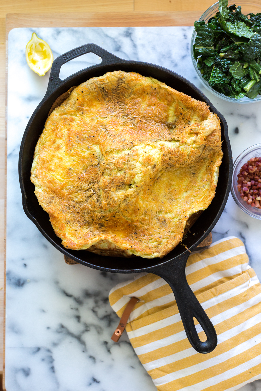 Aged Gouda Pancetta and Kale Savory Dutch Baby - out of the oven