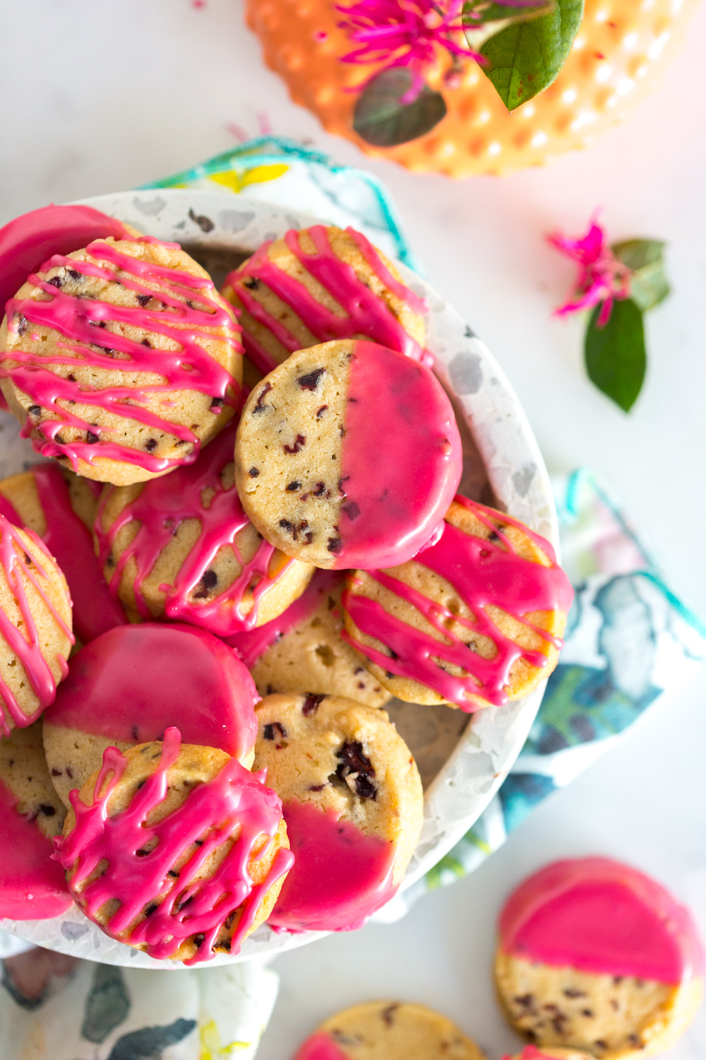 Plateful of Glazed Hibiscus Shortbread Cookies