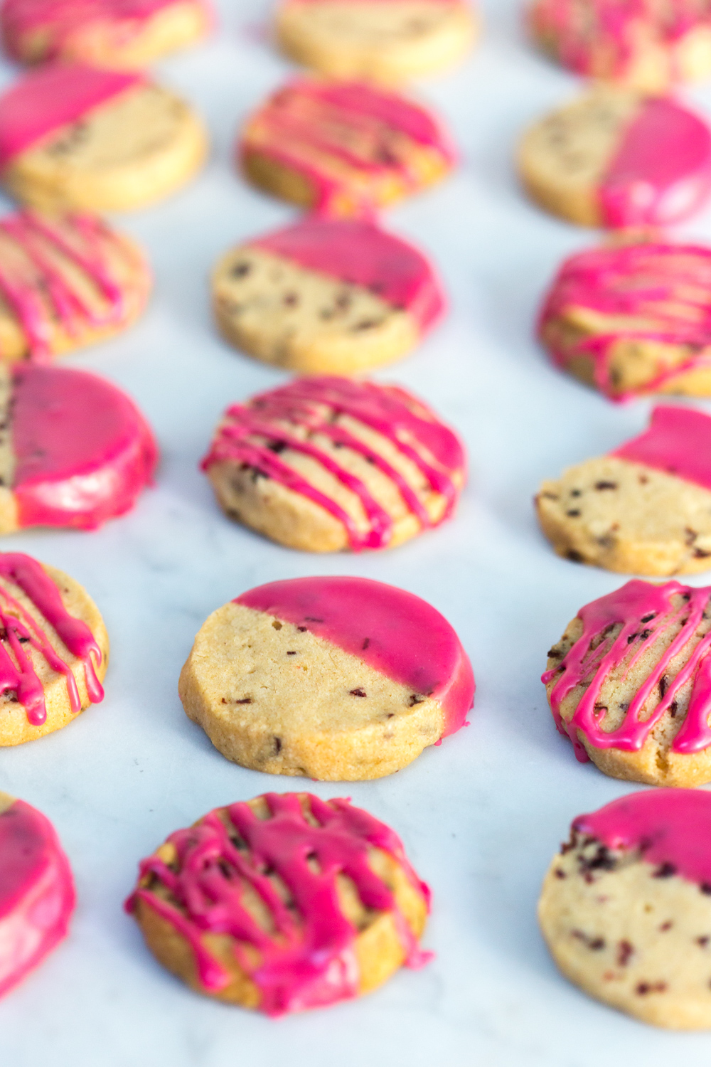 Glazed Hibiscus Shortbread Cookies dipped and drizzled