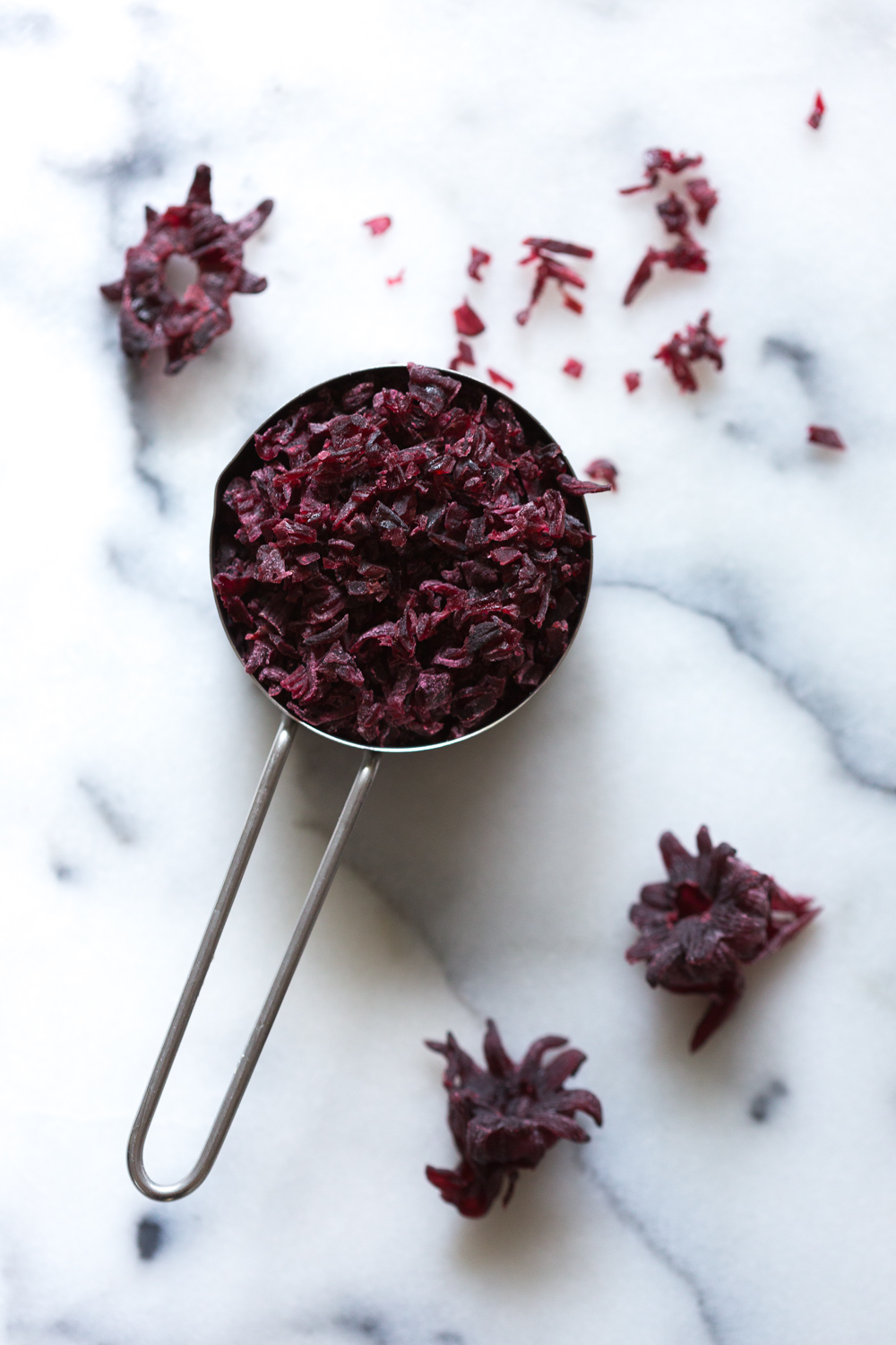 Chopped dried hibiscus flowers for Glazed Hibiscus Shortbread Cookies