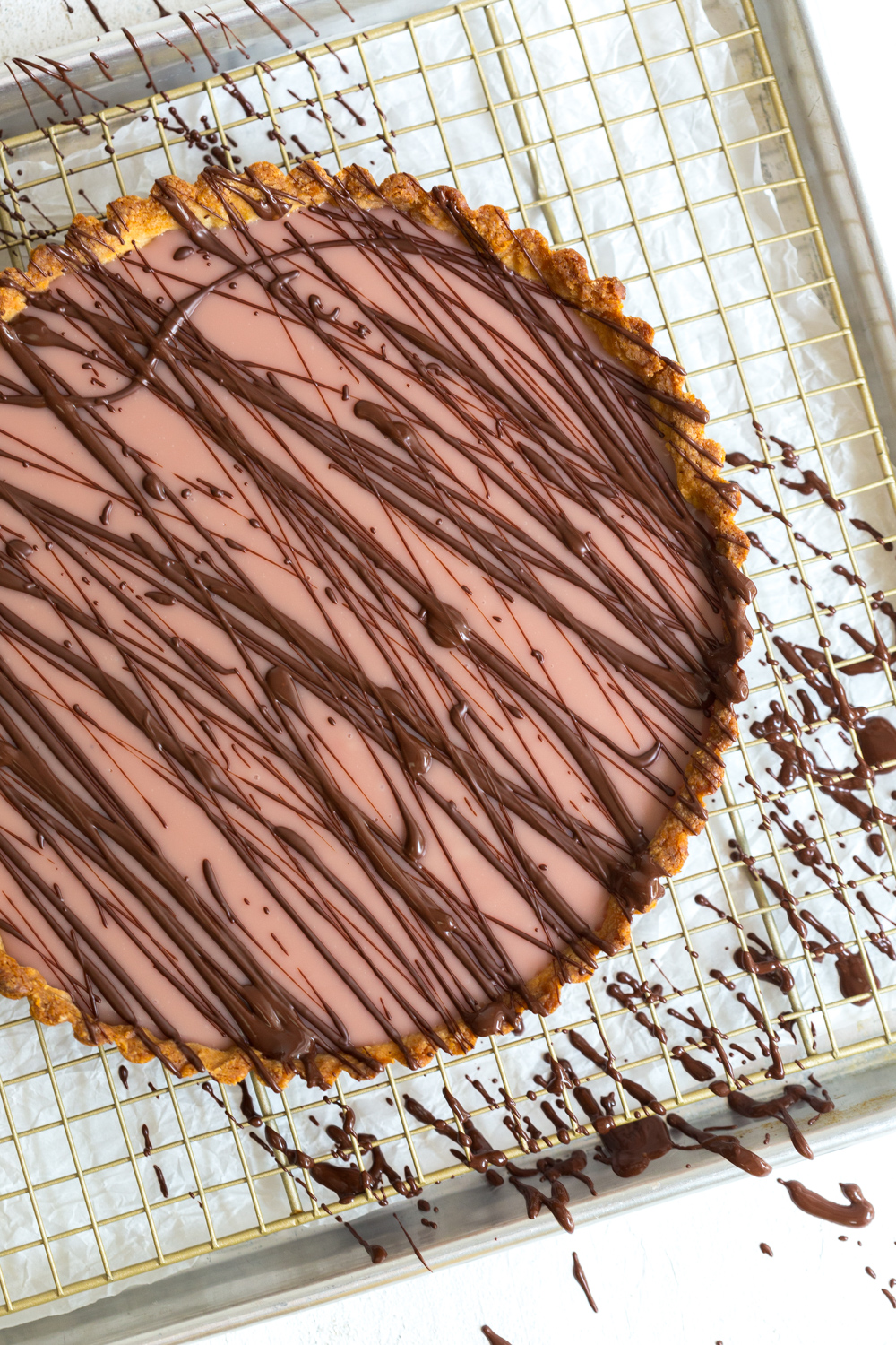 Adding dark chocolate to Ruby Cacao Ganache Tart