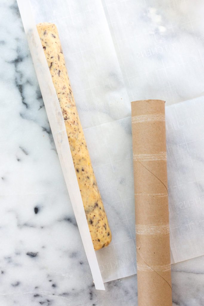 Shaping shortbread cookie dough into logs