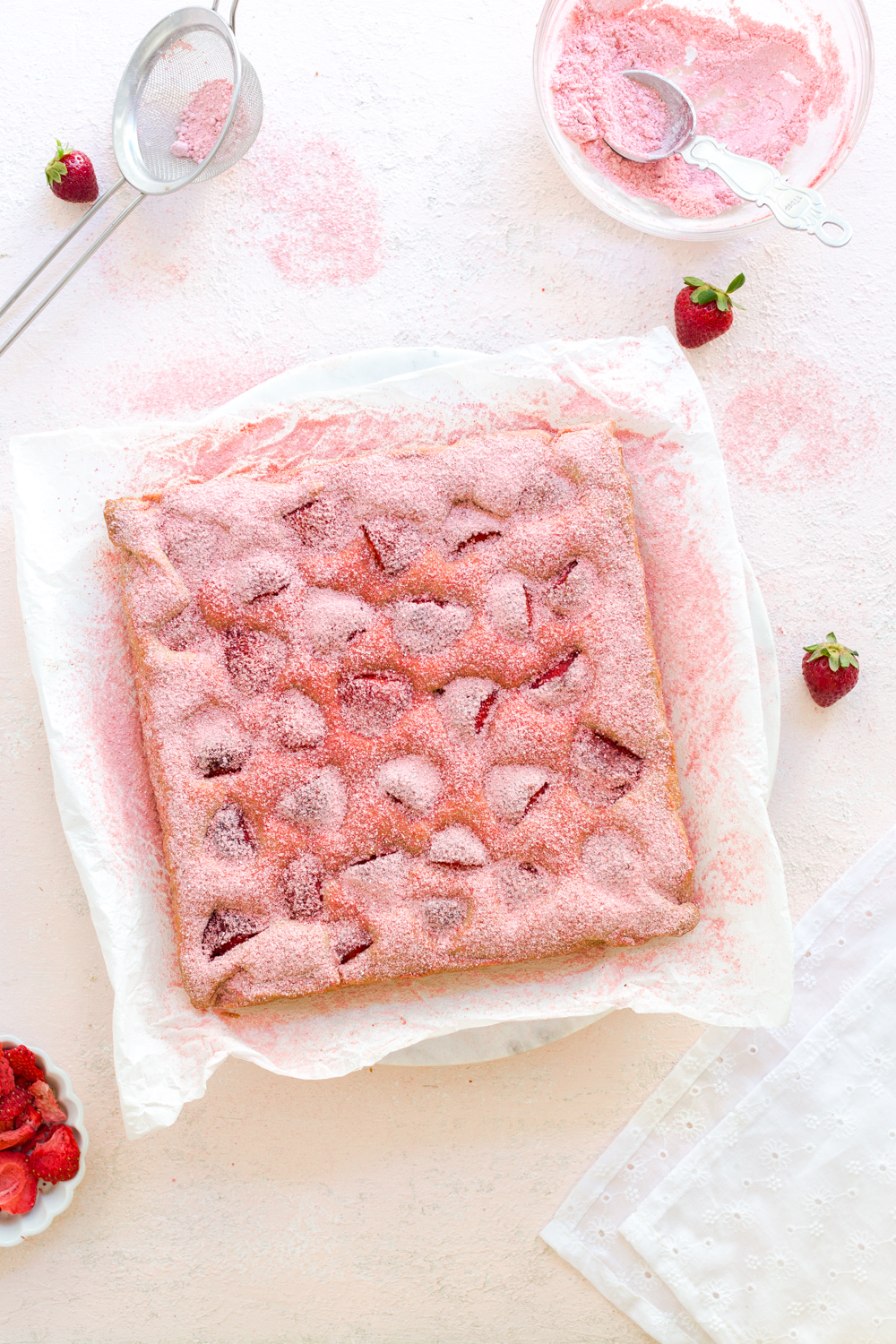 Adding freeze dried strawberry powder topping to Strawberry Blondies