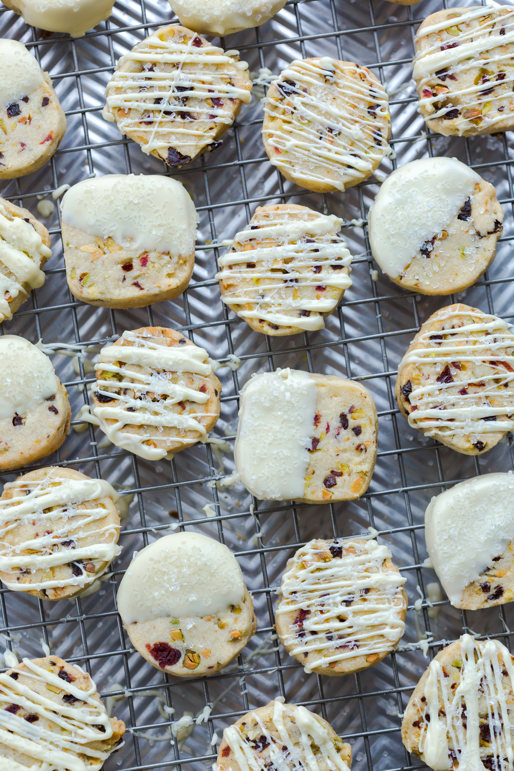 Cherry Pistachio and White Chocolate Shortbread Cookies on rack