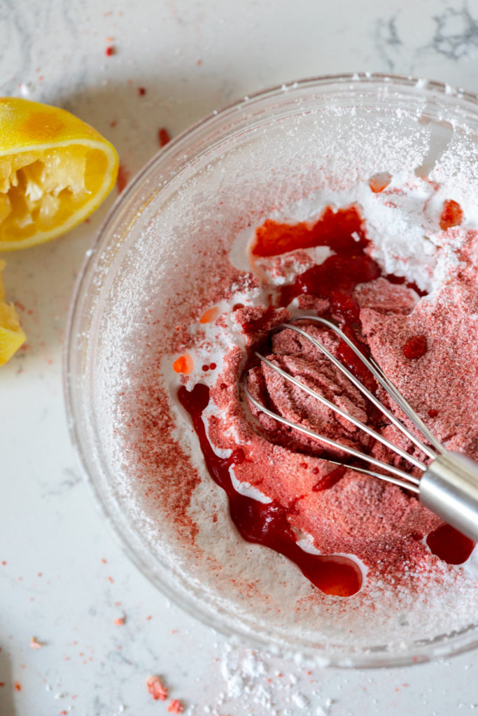 Mixing glaze for Strawberry Lemon Heart Cookies