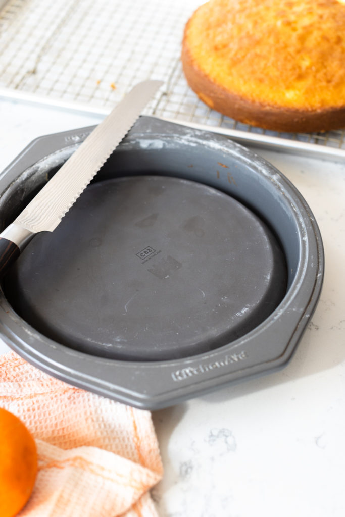 a plate in a cake pan for leveling