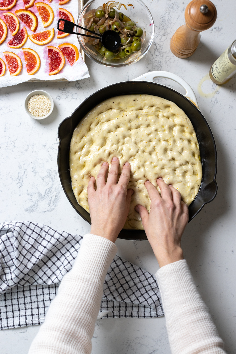 dimpling focaccia dough