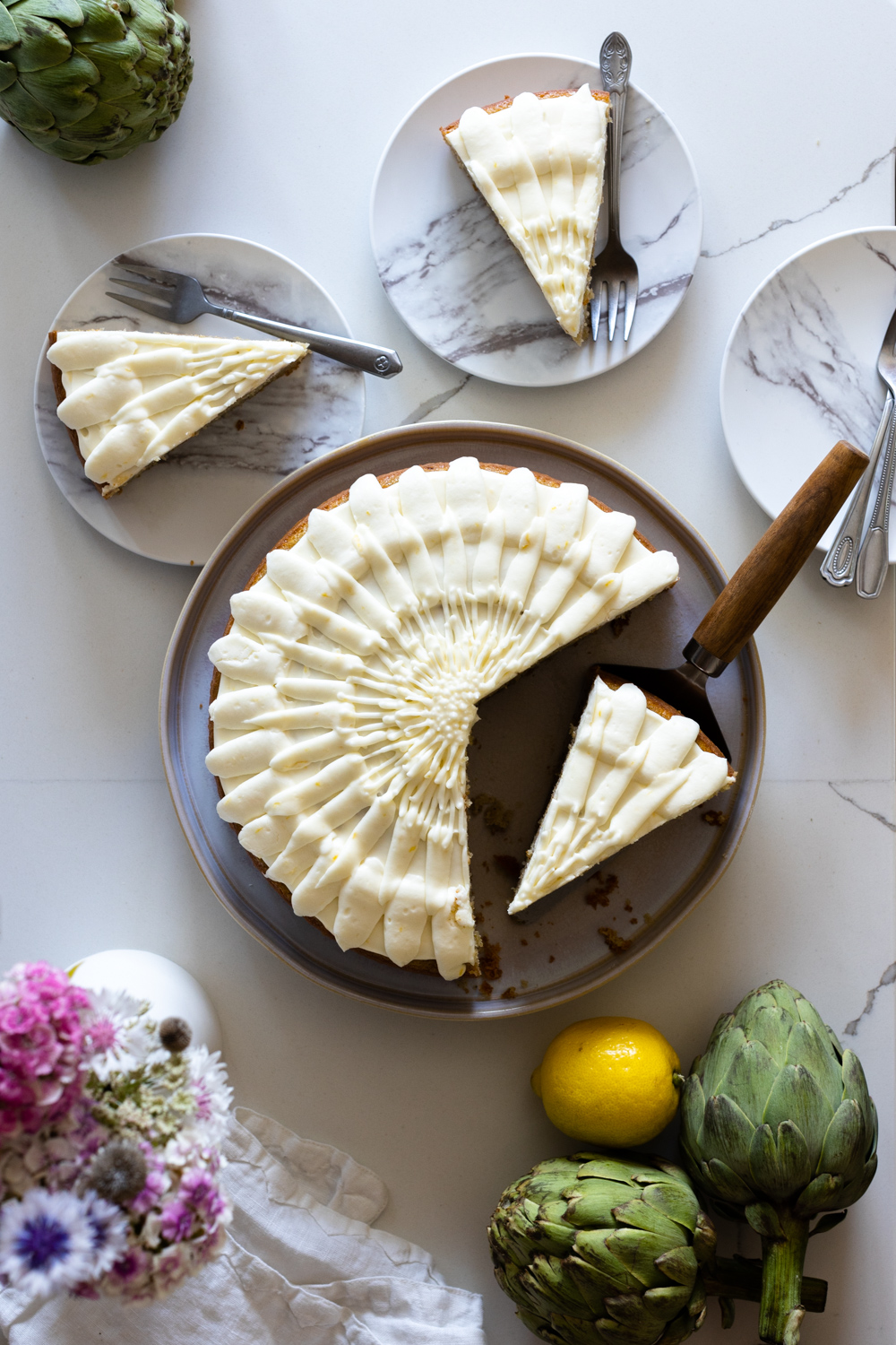 Artichoke Olive Oil Cake with Lemon Cream Cheese Frosting sliced
