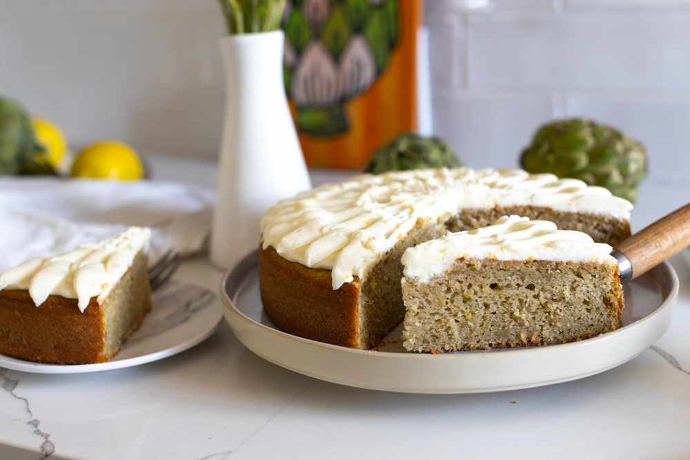 Slice of Artichoke Olive Oil Cake with Lemon Cream Cheese Frosting