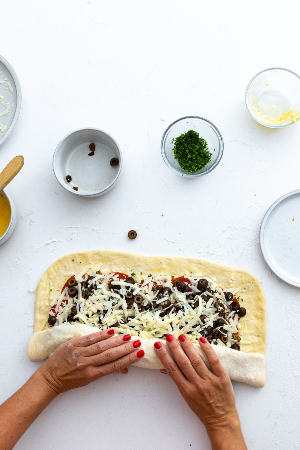 Rolling the Pepperoni Black Olive Stromboli