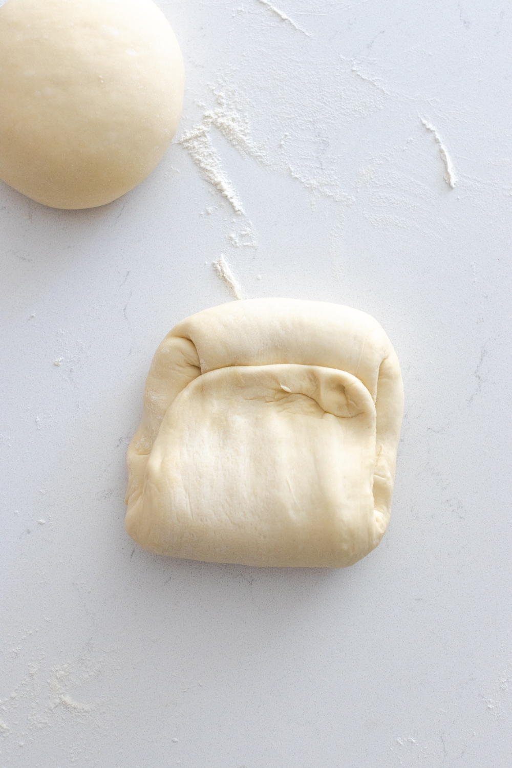 shaping pizza dough boules