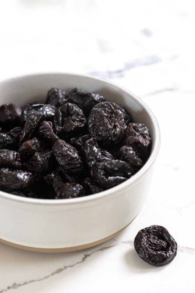prunes, aka dried plums, in a bowl
