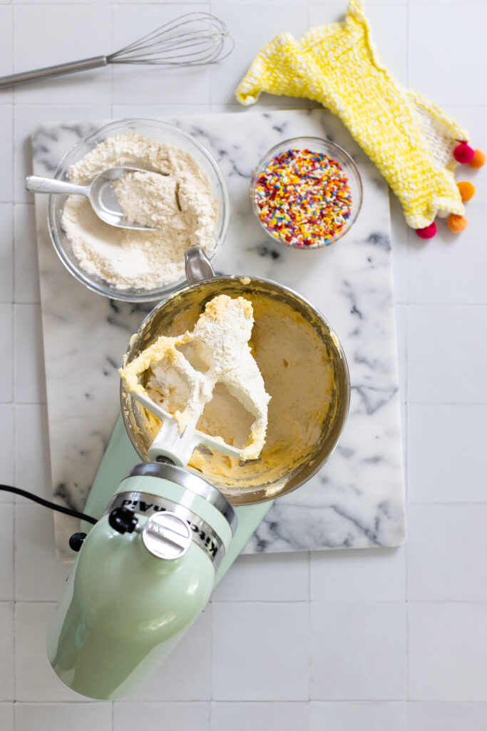 mixing Lemon Rainbow Sprinkle Cookie dough