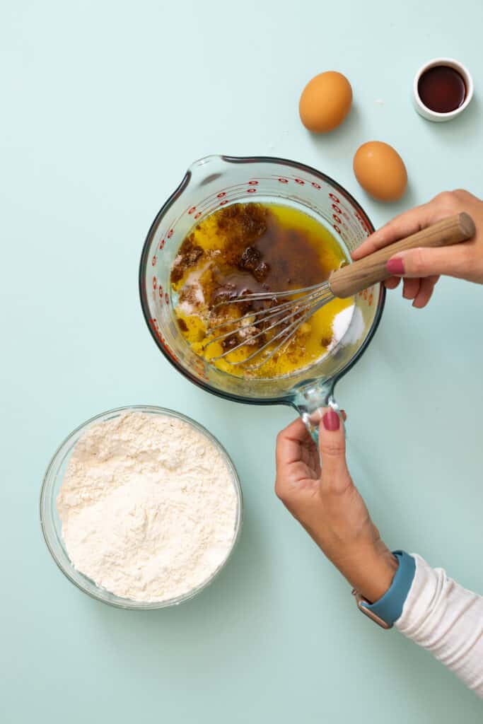 whisking browned butter with sugar