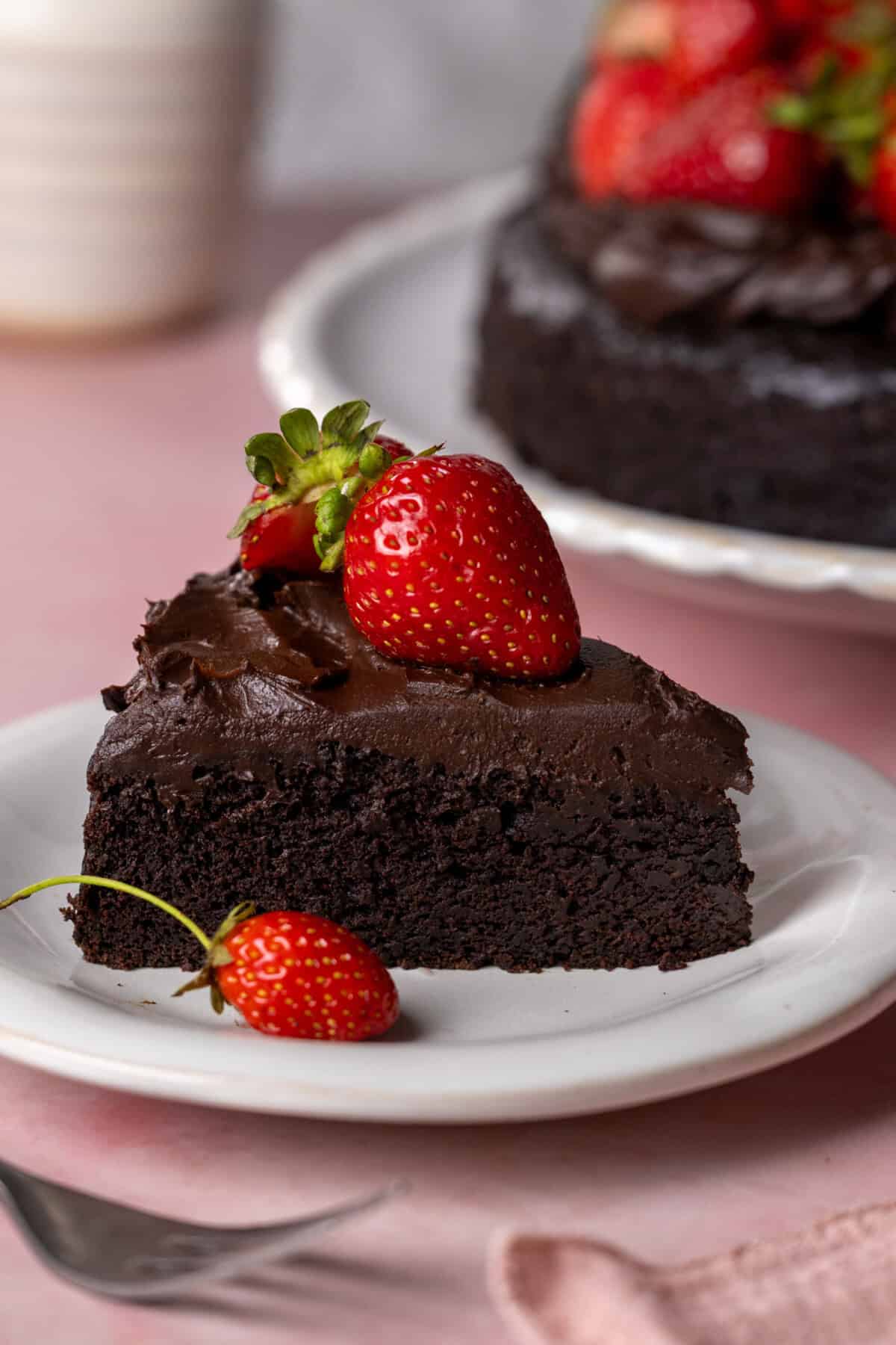 Plush slice of Avocado Chocolate Cake with Strawberries