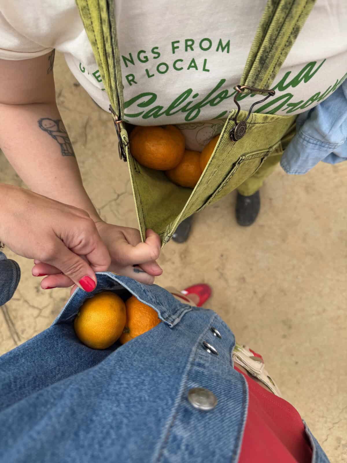Rose and I sneaking snacks at Kimball Avocados