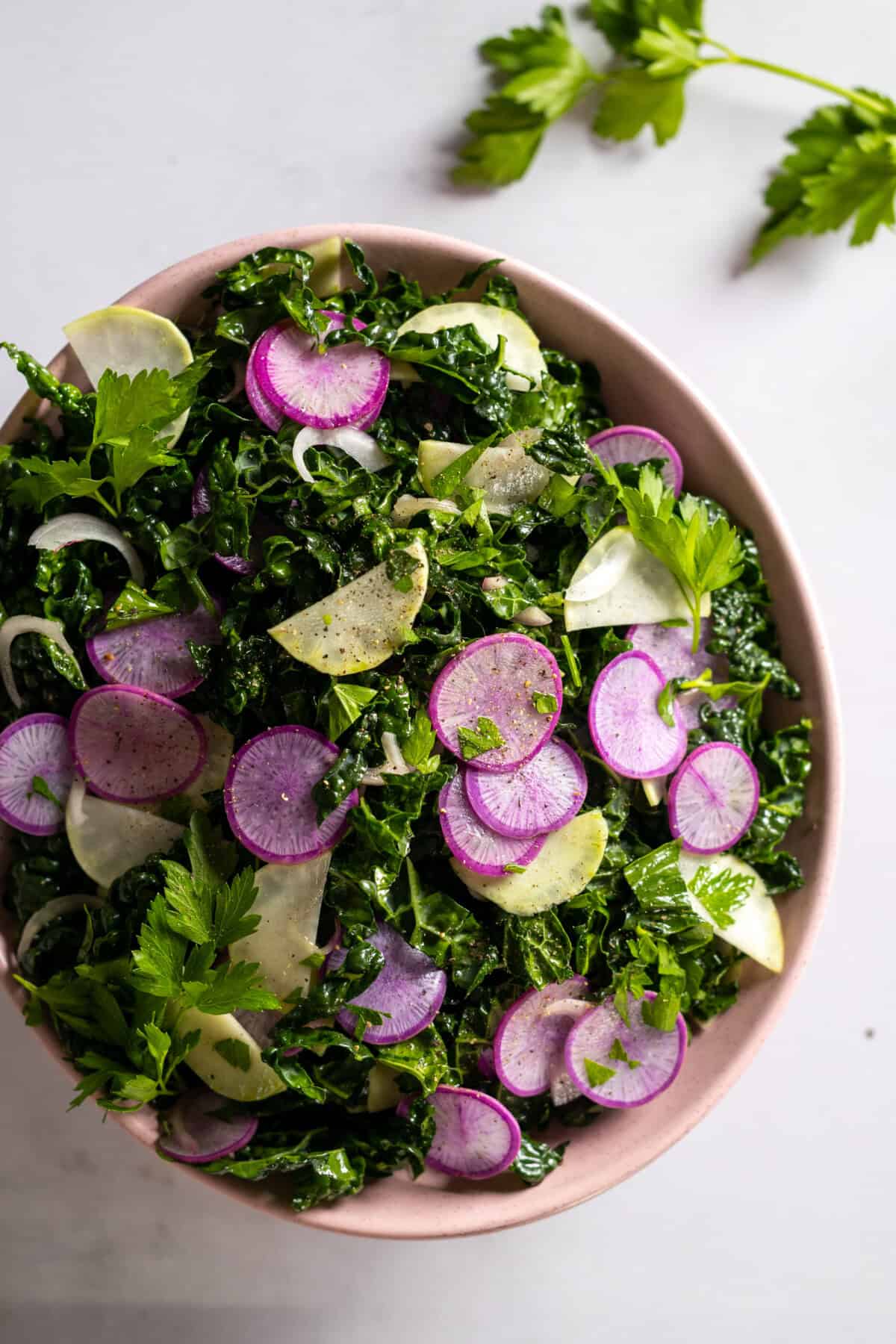Tossed Kale Radish Kohlrabi Salad with dressing