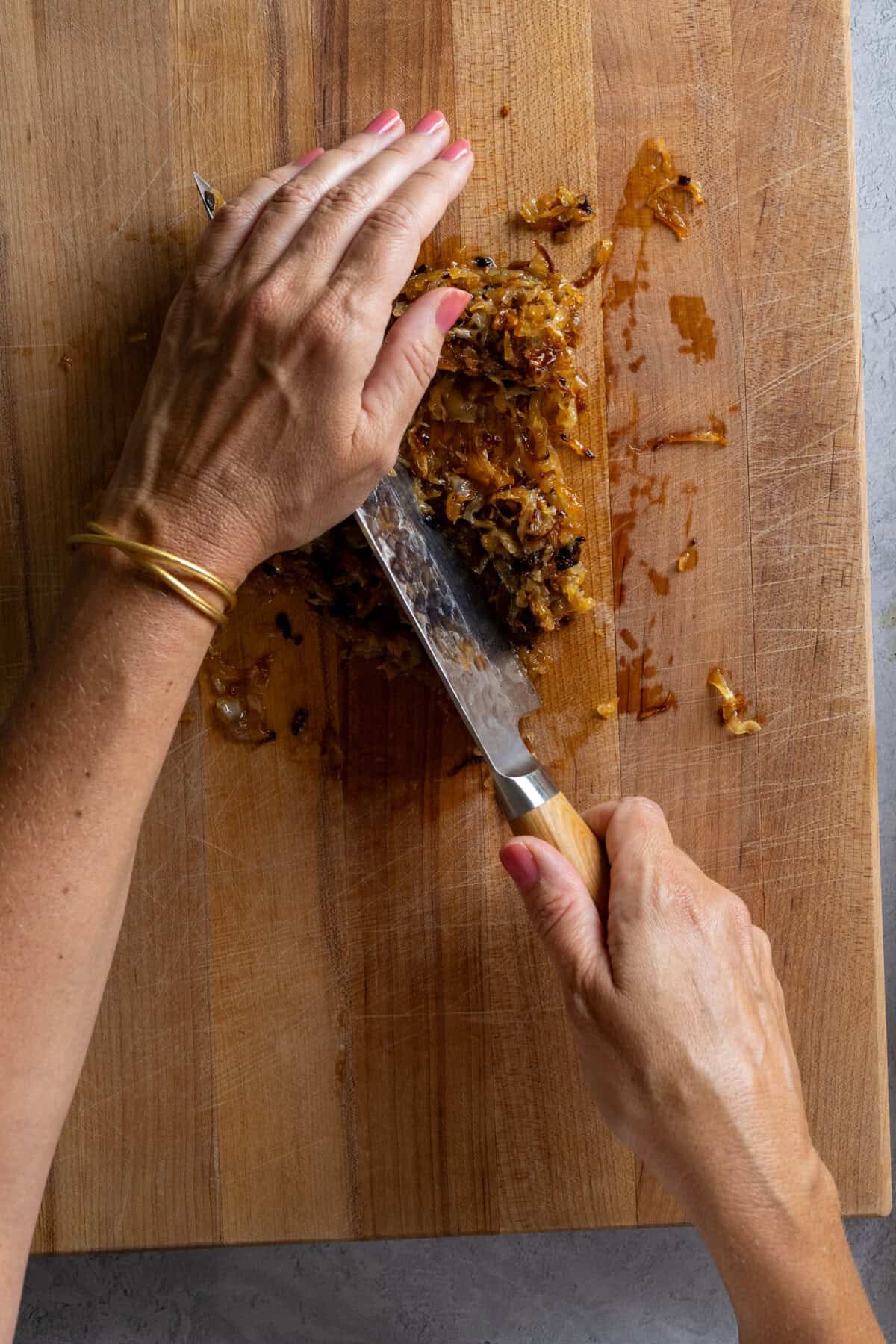 chopping caramelized onions