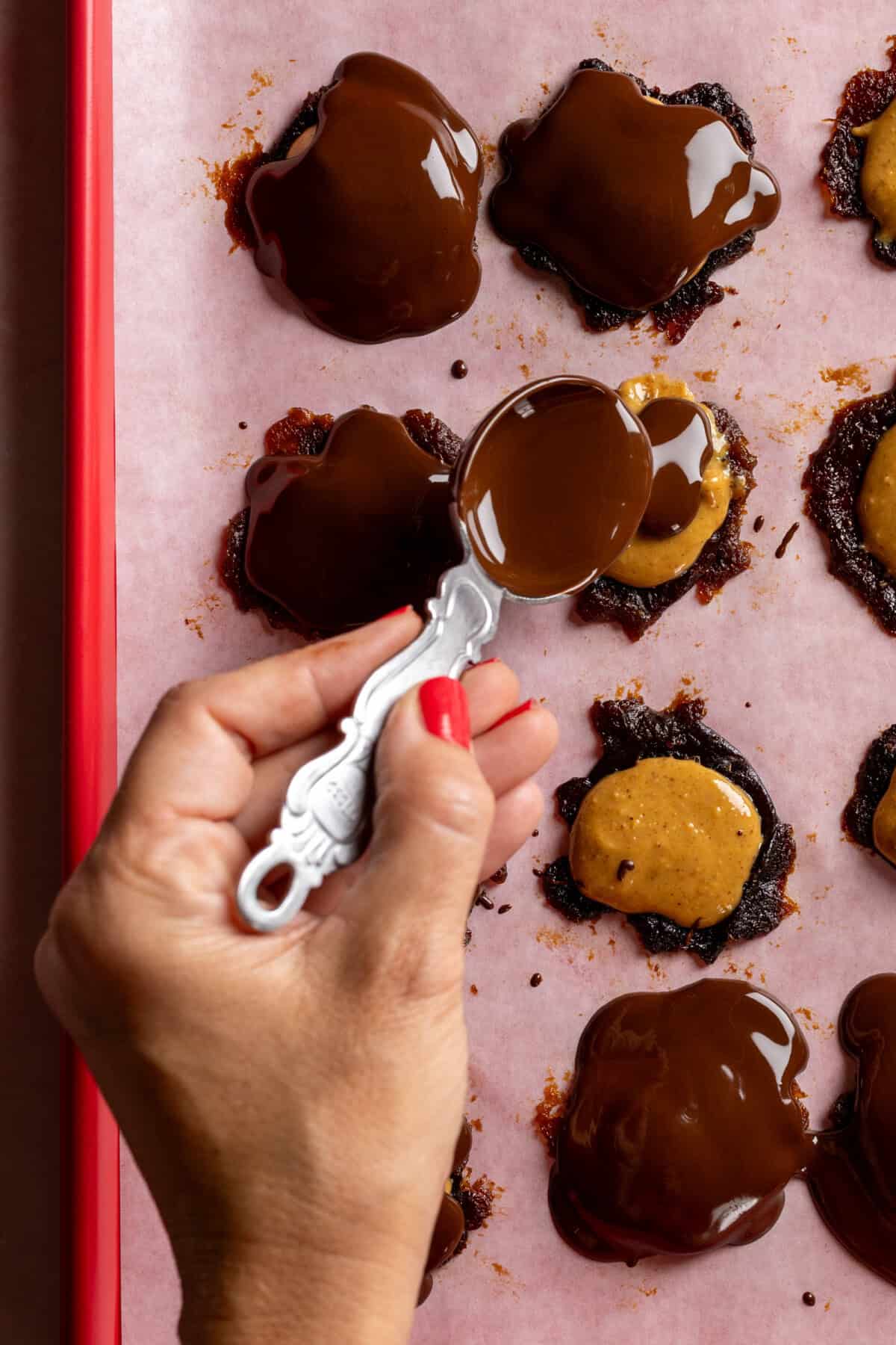 Pouring on melted dark chocolate