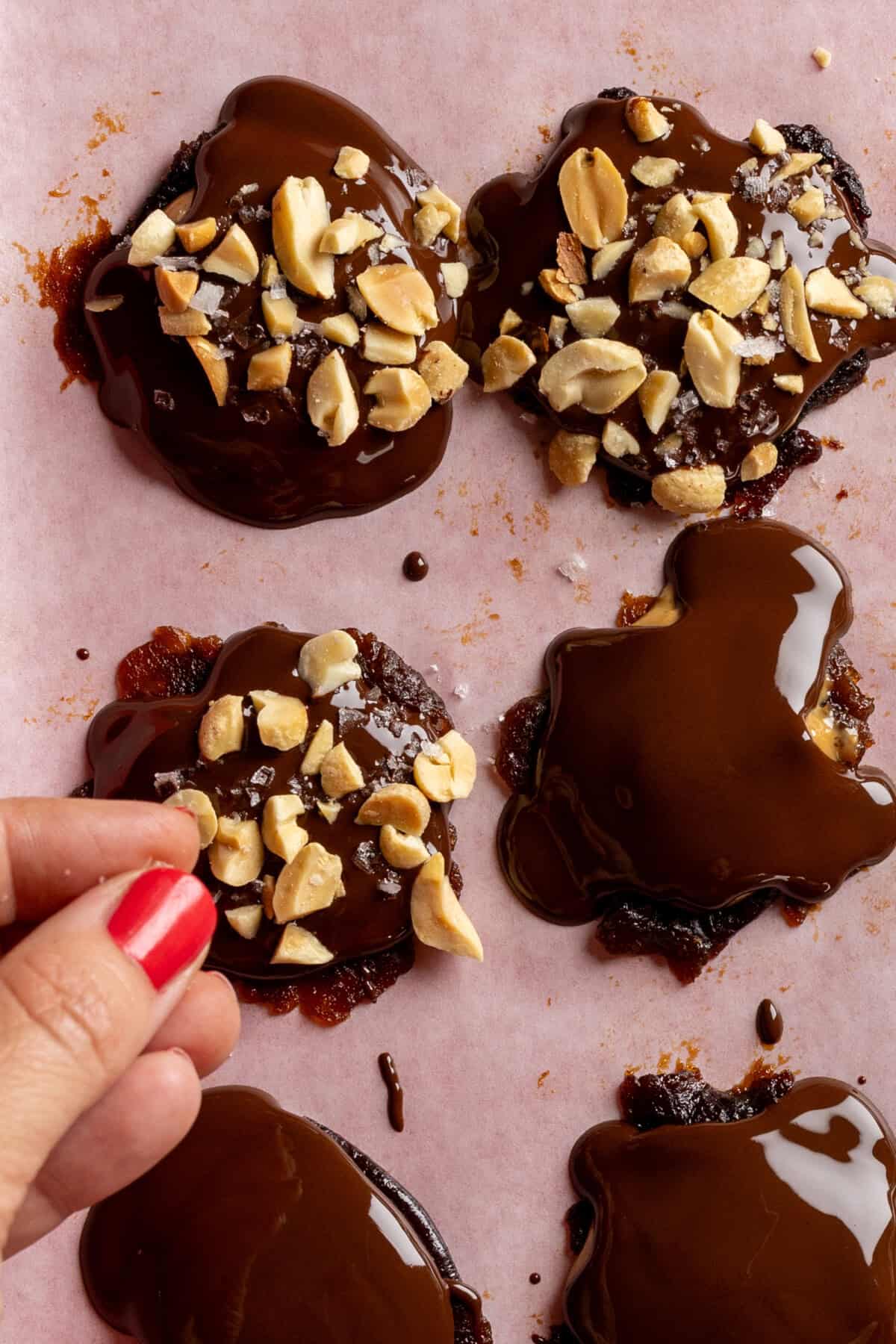 adding salt to Smashed Prune Snickers Bites