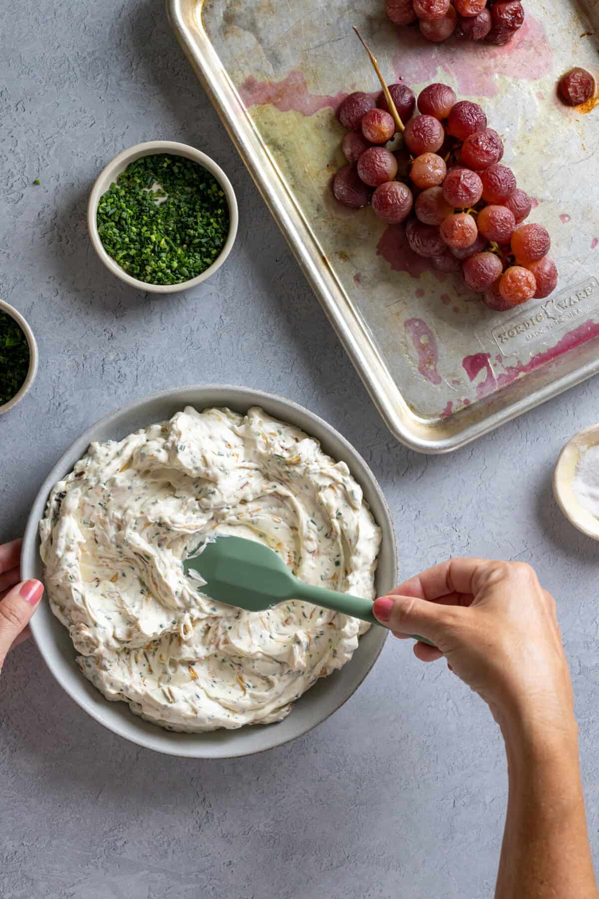 adding Caramelized Onion Dip to bowl